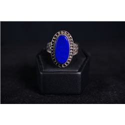 A silver ring inlaid with Lapis Lazuli.