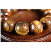 Image 5 : A Tiger's Eye necklace + bracelet.