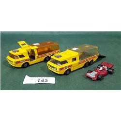 2 VINTAGE MATCHBOX K-7 RACING TRANSPORTER TRUCKS W/CAR