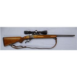 Ruger 1V, 6 mm single shot w/Tasco 3-9 variable scope, S#133-29753, 23”, like new