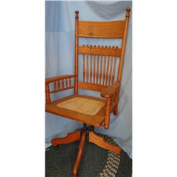 Oak swivel office chair, caned seat