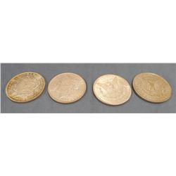 4 Morgan dollars - 1899-O, 1886, 1902-O, 1921D