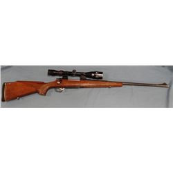 Rem 700, 7mm Rem Mag, s#6563249, with 4-12x40 scope