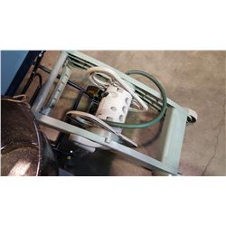 GARDEN HOSE CADDY AND SPRINKLER