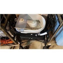 FOLDING WALKER AND FOOTSPA