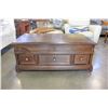 Image 1 : ASHLEY FLOOR MODEL LIFT TOP COFFEE TABLE WITH 3 STORAGE DRAWERS, LIGHT FINISH RETAIL $1399