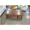 Image 2 : ASHLEY FLOOR MODEL LIFT TOP COFFEE TABLE WITH 3 STORAGE DRAWERS, LIGHT FINISH RETAIL $1399
