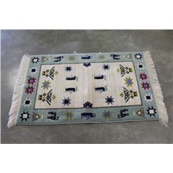 BLUE WOOL RUG WITH PENGUIN DESIGN