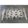Image 1 : BLUE WOOL RUG WITH PENGUIN DESIGN