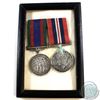 Image 1 : 2x Framed 1939-1945 WWII Service Medals. Medals are in a black wooden frame however the backing is i