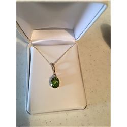 Homestead Jewelries has donated a beautiful peridot and diamond necklace