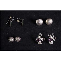 A set of four pairs of earings