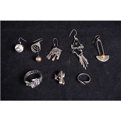 Eight sets of silver jewelries.