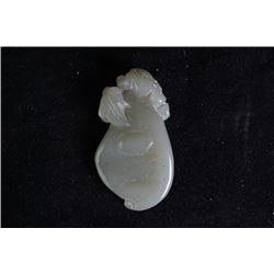 A light greenish white jade pendant.