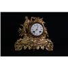 Image 1 : A Gilt clock, small crack on the top.
