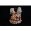 Image 2 : A "Guardian Angel" porcelain figurine.