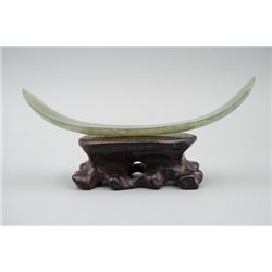 A jade "Ru Yi" hairpin.