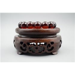 A baltic amber cherry beads bracelet.