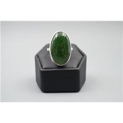 A siberian russian spinach green jade cbochon ring.