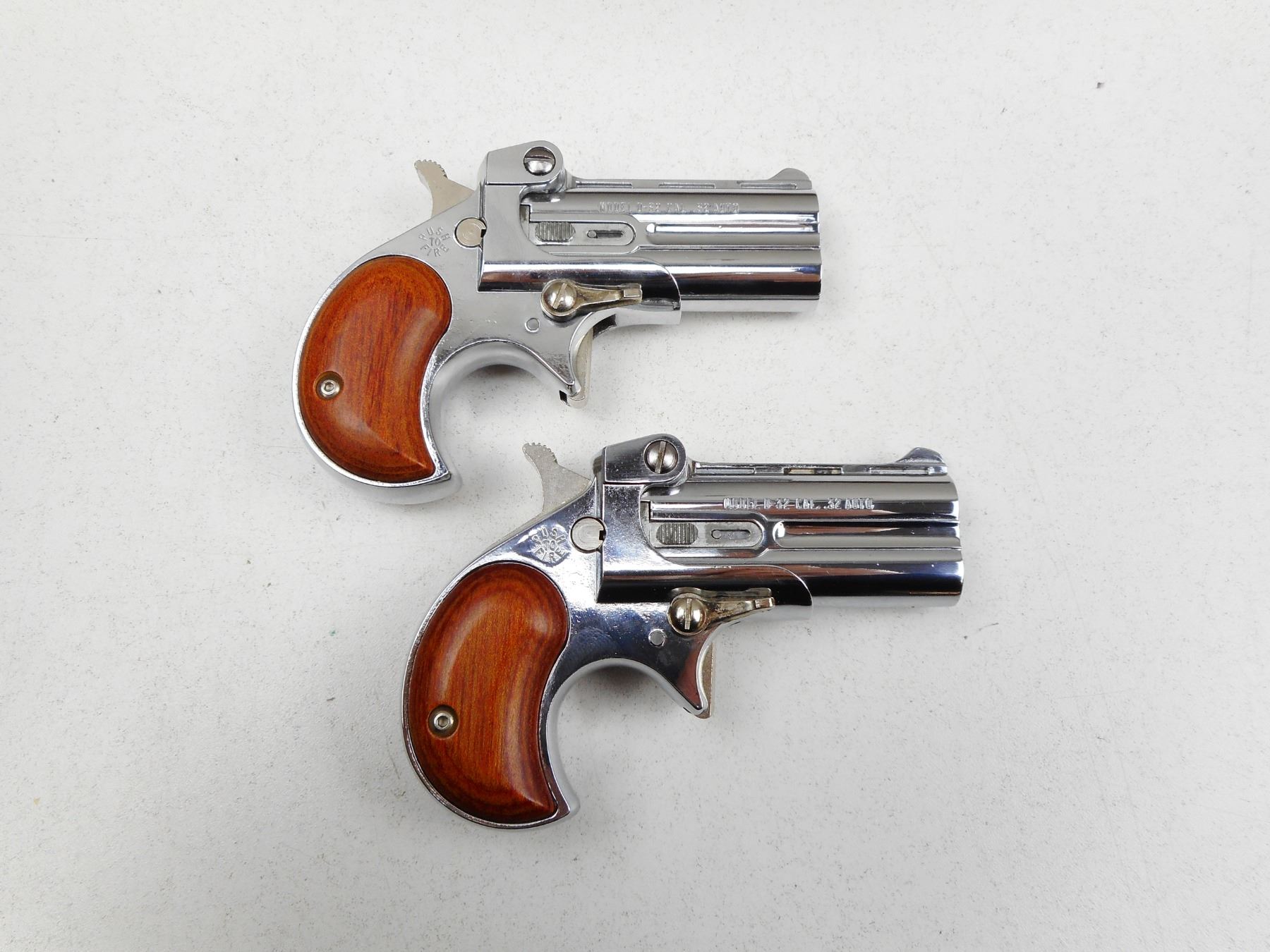 Davis Model 2 A PAIR OF DAVIS , MODEL: D32 , CALIBER: 32AUTO