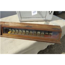 BRASS METAL DISPLAY IN WOOD CABINET