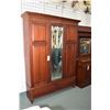 Image 1 : Antique three piece two door wardrobe with two drawer base and full length bevelled mirror in center