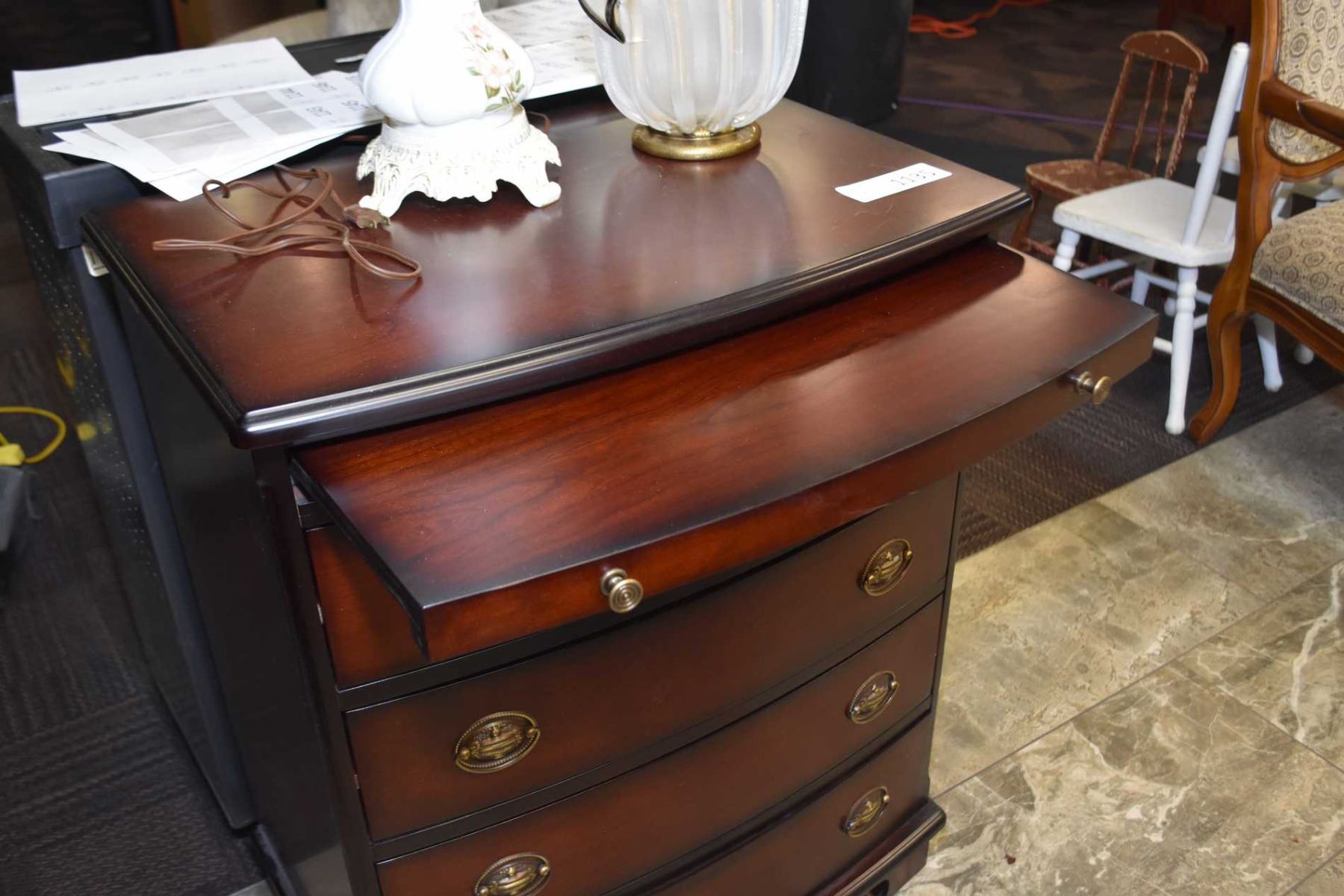Modern four drawer side table with pull out tray
