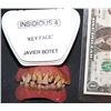 Image 1 : INSIDIOUS 4 THE FINAL KEY SCREEN MATCHED HERO KEY DEMON TEETH