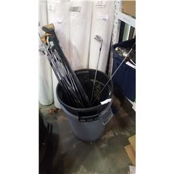 2 GARBAGE CANS WITH LOT OF GOLF CLUBS