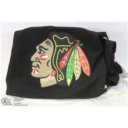 TOEWS SIZE 54 CHICAGO BLACKHAWK JERSEY WITH TAGS.