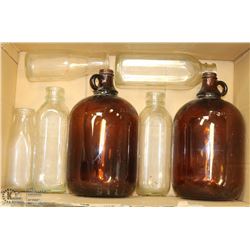 BOX OF ANTIQUE MILK AND 1 GAL JUGS