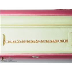 49) ST. SILVER ROSE GOLD PLATED TENNIS BRACELET