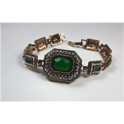 16)  TURKISH STYLE GOLD TONE, CLEAR & GREEN