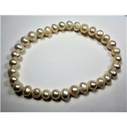 15)  FRESH WATER PEARL BRACELET