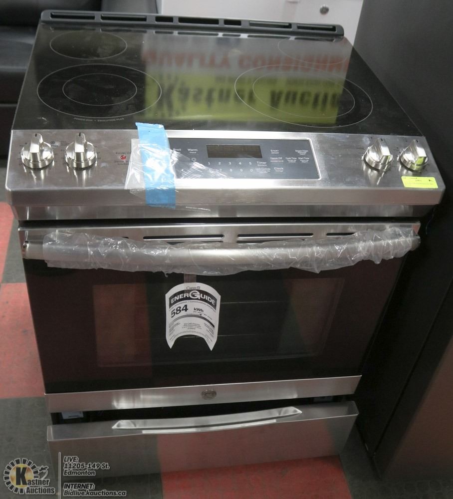 30" SLIDE IN GE FLAT TOP 4 BURNER ELECTRIC RANGE.