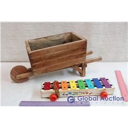 Wagon Flower Planter and Fisher Price Music Toy