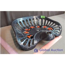 Cast-Iron Tractor Seat, The Rake