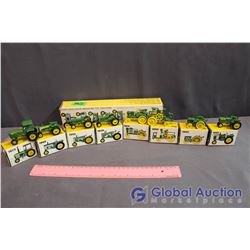 Set of (8) John Deere Miniature Metal Toy Tractors (all in Box)