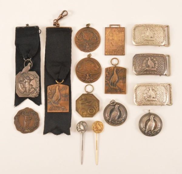 Trap Shooting Belt Buckles, Medals, & Pins