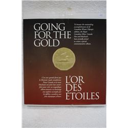 Canada Loonie (1) & 2 Olympic Macleans Magazines from 2002