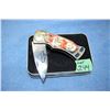 Image 1 : Fighter Wolf Head Folding Knife - in a Tin Box