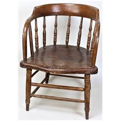 Antique wood saloon chair.