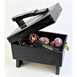 Vintage cowboy boot polish box with contents.