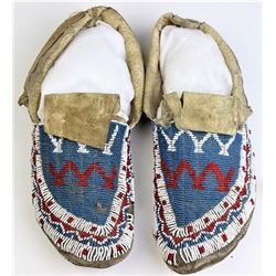 Fully beaded uppers Sioux moccasins, 11" long.