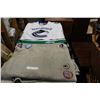 Image 2 : BROWNIE BLANKET WITH BADGES AND CANUCKS AWAY JERSEY