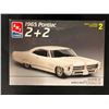 Image 1 : AMT/ERTL 1:25 SCALE 1965 PONTIAC 2 + 2 UNASSEMBLED MODEL KIT