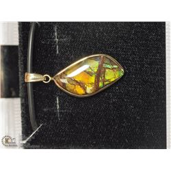 44) 14K GOLD AMMOLITE PENDANT ON CORD