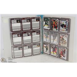 BINDER OF ASSORTED HOCKEY CARDS.