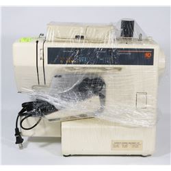 SINGER PORTABLE SEWING MACHINE WITH