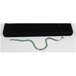 36) STERLING SILVER ENHANCED EMERALD BRACELET